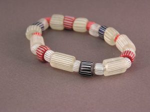 Bracelet collection of Red, Blue and Creamy white Gooseberries by Janet Walker