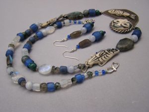 Fog Woman Necklace with various Bohemian Beads and Blue Gooseberies Trade Bead Bracelet made with Sky Blue Padres, Blue Russians, Chevrons and Venetian Fancy beads by Janet Walker